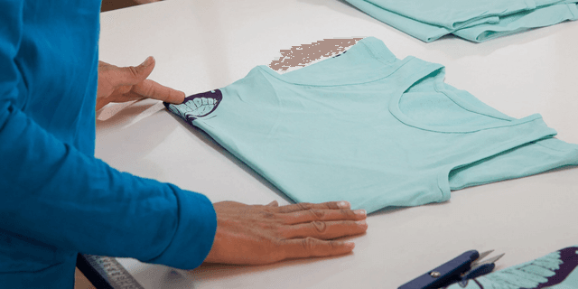 Construction worker in yellow high-visibility vest and white hard hat